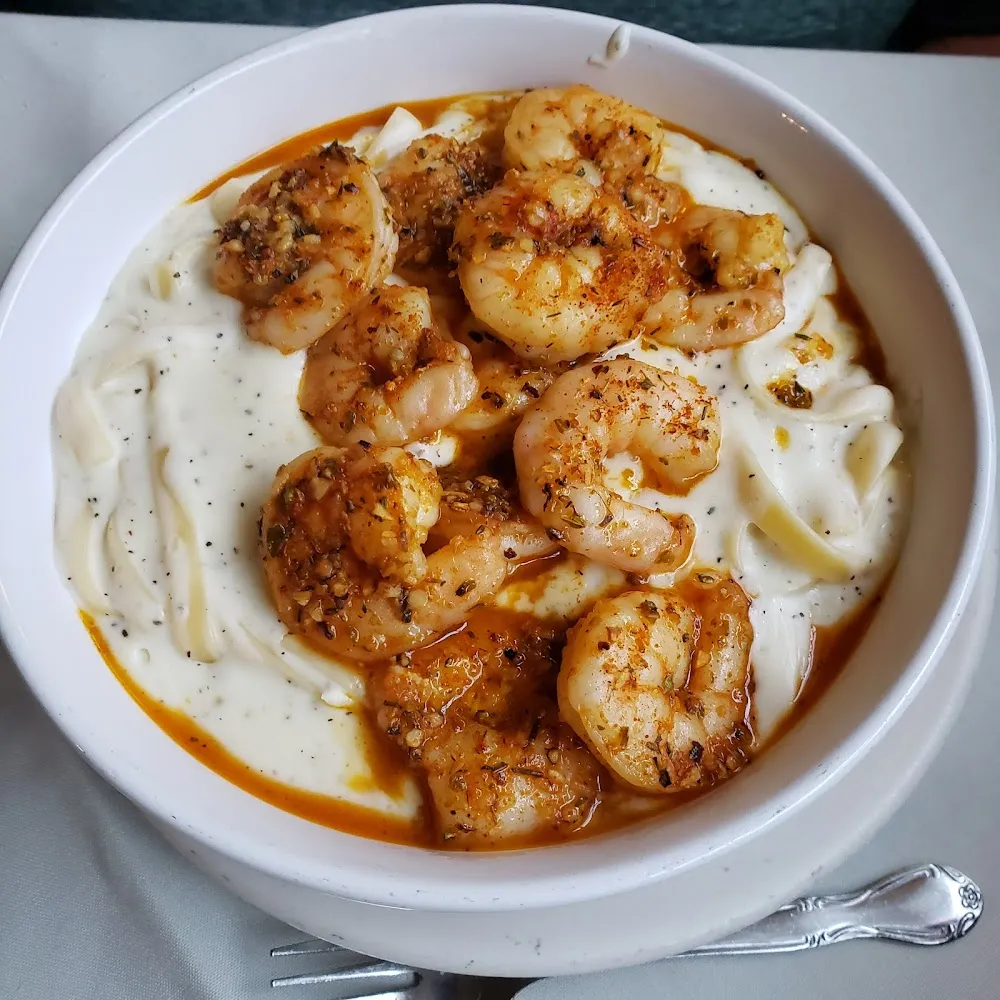 Blackened Shrimp over Fettuccine Alfredo